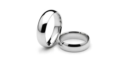 Two silver wedding rings on a white background in a studio setting close up