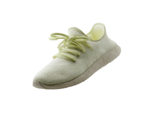 Floating yellow sneaker with loose laces.