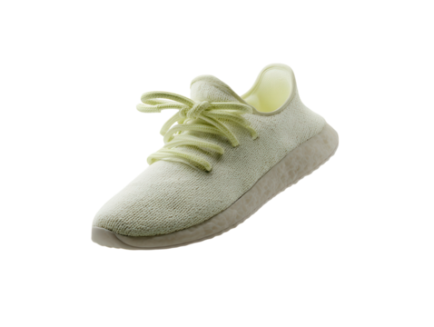 Floating yellow sneaker with loose laces. - Powered by Adobe