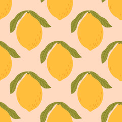Decorative seamless pattern of ripe yellow lemons with leaves on a light beige background