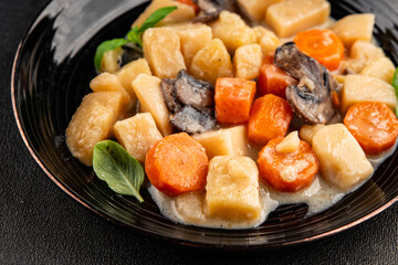 Potato stew mushrooms and vegetables natural tasty snack fresh delicious gourmet food background on the table rustic top view copy space keto and paleo diet vegerian and vegan food