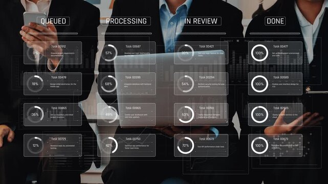 A group of business professionals engages with technology to manage tasks and workflows, displaying project status updates and data visualizations on a laptop. Raster