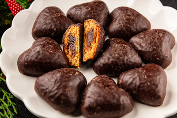 Gingerbread chocolate heart shaped honey cakes Christmas sweet dessert new year natural product tasty snack fresh delicious gourmet food background on the table rustic top view copy space