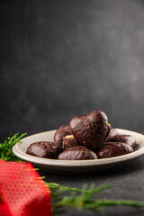 Gingerbread chocolate heart shaped honey cakes Christmas sweet dessert new year natural product tasty snack fresh delicious gourmet food background on the table rustic top view copy space