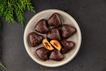Gingerbread chocolate heart shaped honey cakes Christmas sweet dessert new year natural product tasty snack fresh delicious gourmet food background on the table rustic top view copy space