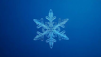 Perfectly formed crystalline snowflake on a clean, deep blue background.