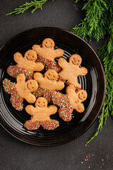 Gingerbread man cookies Christmas sweet dessert new year Christmas background tasty snack fresh delicious gourmet food background on the table rustic top view copy space