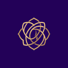 Naklejka premium Abstract golden geometric flower on deep purple background vector design