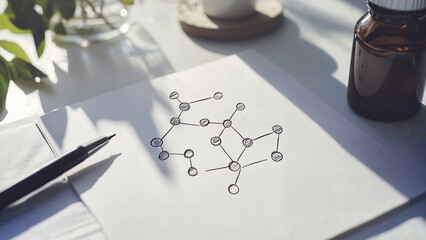 Detailed sketch of a large endorphin molecular formula on a workspace with natural elements and glassware
