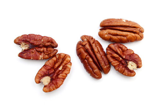 Pecans isolated on white background