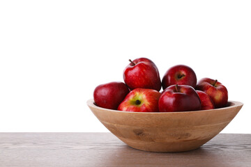 Ripe red apples in bowl on wooden table against white background, closeup. Space for text