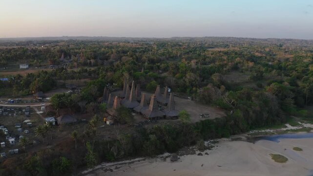 Aerial drone footage of the village of Ratenggaro with the traditional houses at the western site of Sumba island, Indonesia