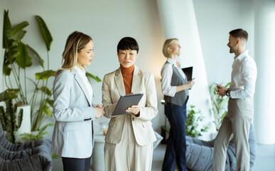 Business meeting with professionals discussing plans in a modern office setting