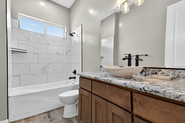 Bright Shower Area, Sunlit Bathroom Featuring Classic Fixtures And Functional Storage Solutions