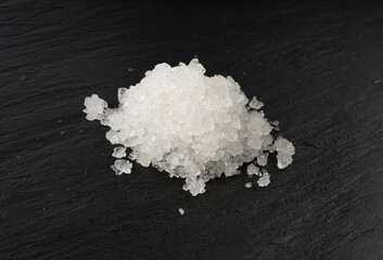Dead sea salt pile, white crystals for body spa, sodium chloride similar to crushed ice, spa scrub