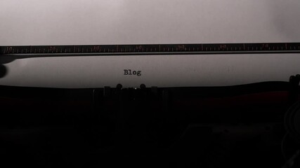 Vintage typewriter creating content on fresh white paper, capturing the essence of classic communication, writing, and blogging with a nostalgic feel for sharing ideas