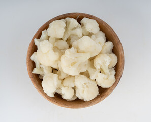 Steamed cauliflower pieces close up