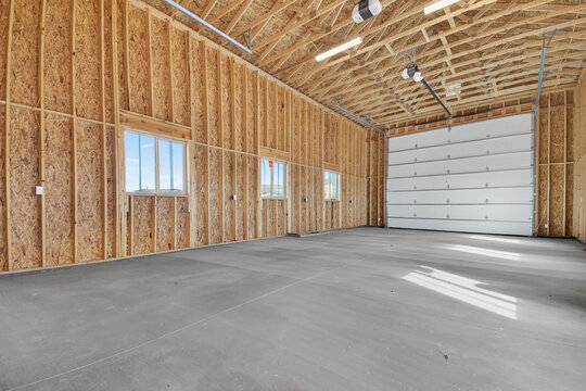 Incomplete Garage Space, Potential Storage Or Workshop Unit With Exposed Structures And Daylight