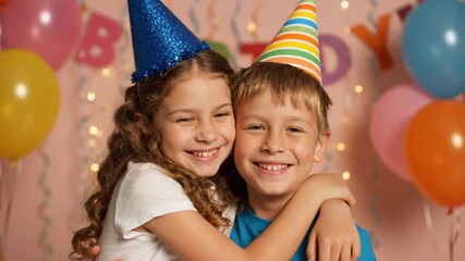 Happy children in party hats hugging at a vibrant birthday celebration - Powered by Adobe