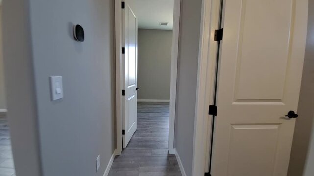 Leading To Bedrooms With Stylish Features, Neutral Walls Accompanied By Staged Walkthrough Visuals