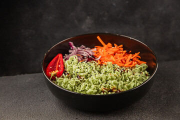 vegetarian noodles jade noodles with vegetables green noodles healthy food budha bowl main course appetizer fresh delicious gourmet food table background rustic food top view copy space