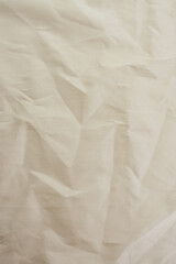 Macro texture of wrinkled milky silk fabric