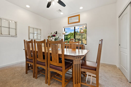Rustic Table Set Outdoors, Intimate Gathering Around Wooden Table Overlooking Lush Garden Scene - Powered by Adobe