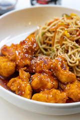 Close-Up of Honey Garlic Chicken with Korean Ramen
