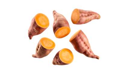 Six fresh sweet potato pieces some whole and some halved showing bright orange flesh isolated on transparent background