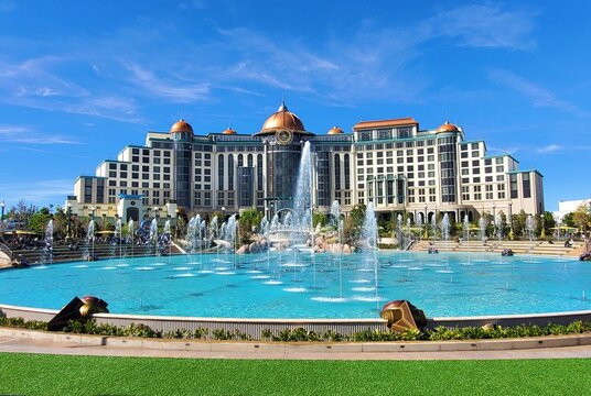 Orlando, Florida, U.S.A - Nov 11, 2025 - The water fountain in front of Universal Helios Grand Hotel by Loews