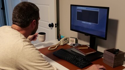 Middle Aged System Administrator Get Late Night Call to Restore Network After Ransomware Cyber Attack - Systems Engineer Restore Backups and Saves Day