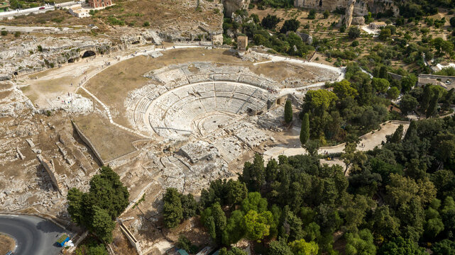 Aerial view of the Greek Theater of Syracuse, Sicily, Italy. These are the ruins of an ancient amphitheater located within Neapolis Archaeological Park. It's the oldest theatre in the Western world.