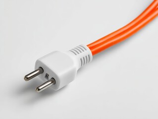 Orange electrical wire with plug isolated on white background