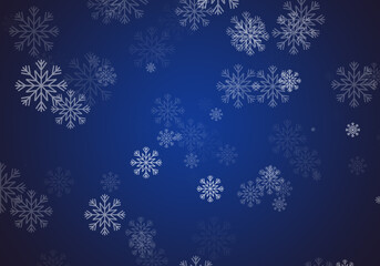 Copos de nieve blancos sobre fondo azul degradado
