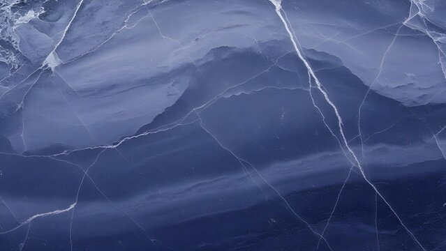 Deep blue frozen ice with intricate white crack patterns, a natural winter texture for a background overlay