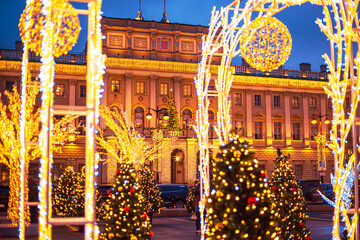 Festive New Year and Christmas decorations in the city. Winter Garden installation. Evening.