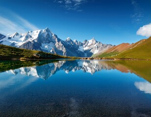 majestic mountain range reflected in the clear waters of an alpine lake
