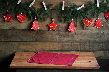 Rustic christmas table background with diy festive wooden ornaments