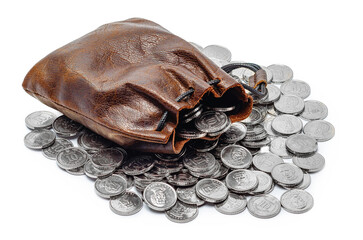 Vintage leather pouch spilling metal coins on white background. Savings, wealth, financial concepts.
