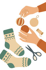 A video shows a woman's hand arranging Christmas paper balls on a table beside knitted socks, preparing for New Year celebrations, crafting handmade gifts, and creating accessories for needlework and