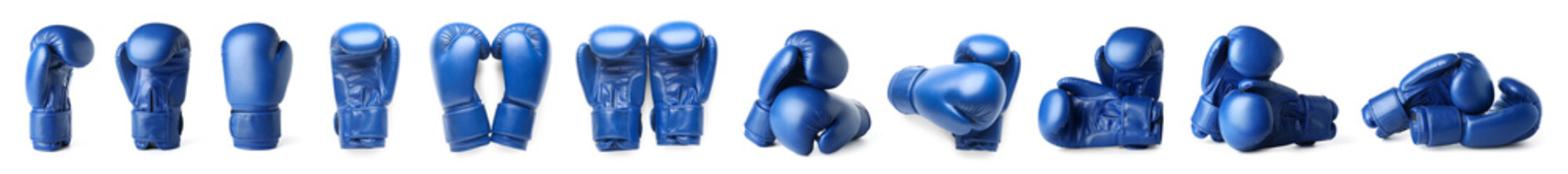 Set of many boxing gloves on white background