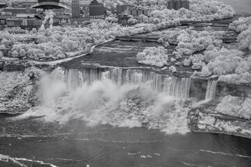 Stunning infrared aerial view of Niagara Falls with dramatic contrast in natural scenery