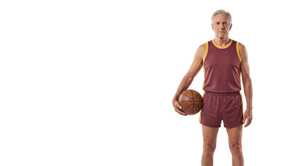 Serious senior man in vintage maroon sportswear holding a basketball while standing on white background