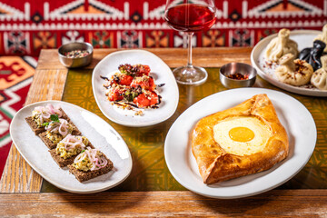 Georgian feast with khachapuri and appetizers