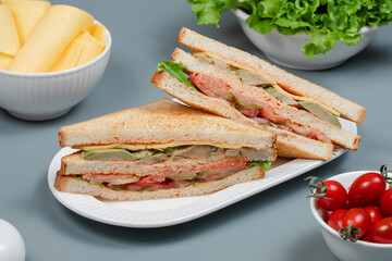 Sliced club sandwich on plate