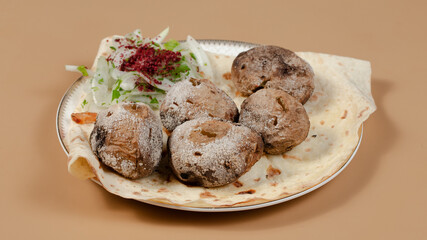 Delicious kebab plate isolated top view