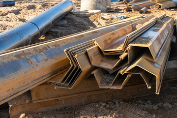 A close-up shot of several interlocking steel sheet piles