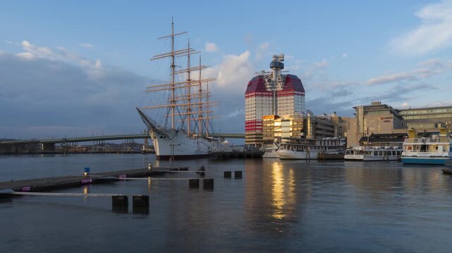 Timelapse View of Lilla Bommen harbour, with the popular ship Barken Viking the biggest sailing ship ever built in Scandinavia. Dolly Pan. 4K. 25p