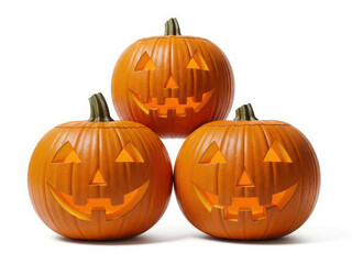Three carved halloween pumpkins stacked together