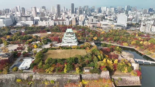 Osaka Castle, Chuo Ward, Osaka, Japan: 4K Aerial Drone Footage of Osaka Castle Park, Moat, Autumn Foliage, Historic Landmark, Japanese Architecture, City Skyline, Urban Landscape, O and Neya River